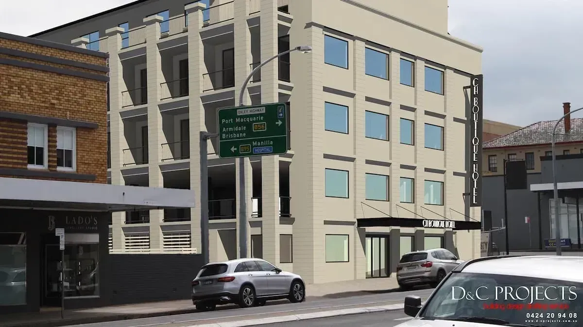 A Modern Building Facade on a Street With Cars, With a Street Sign Overhead — D&C Projects in Tamworth, NSW