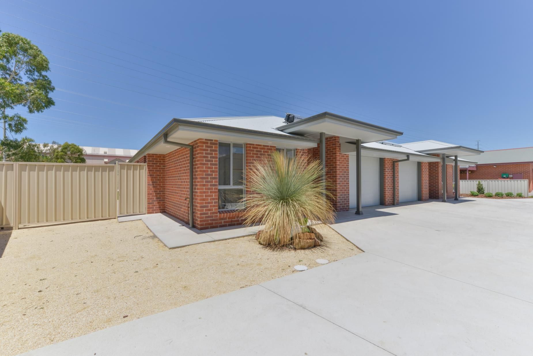 Brick Houses With Garages, Carport, Light Gravel Yard — D&C Projects in Tamworth, NSW