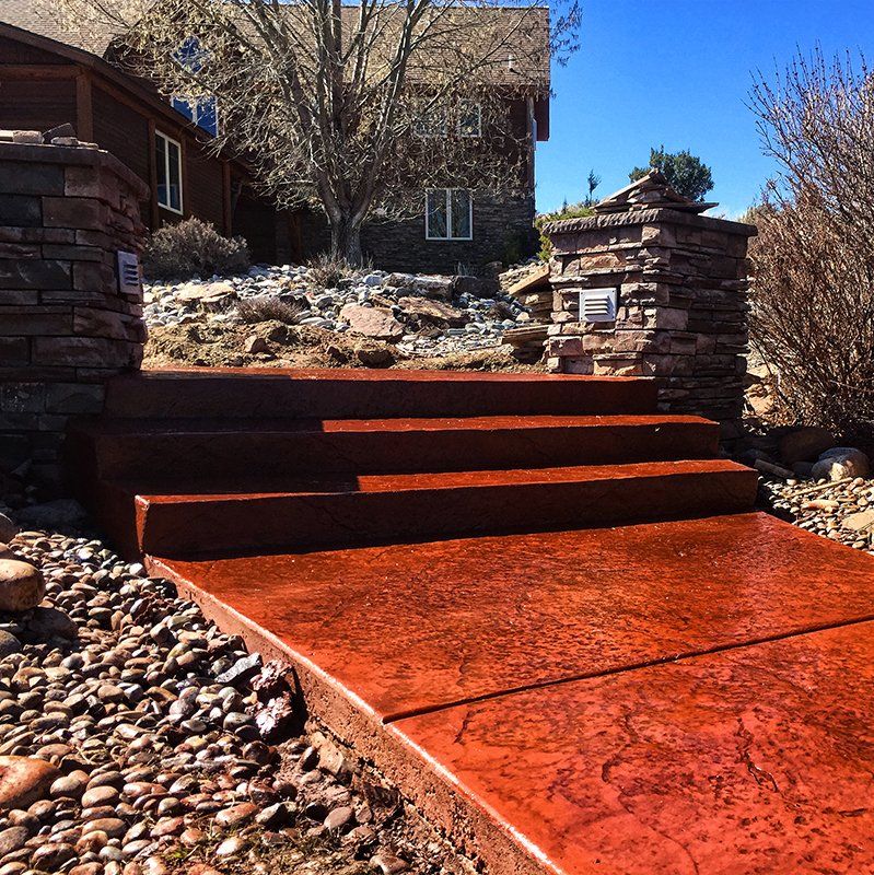 A set of stairs leading up to a house