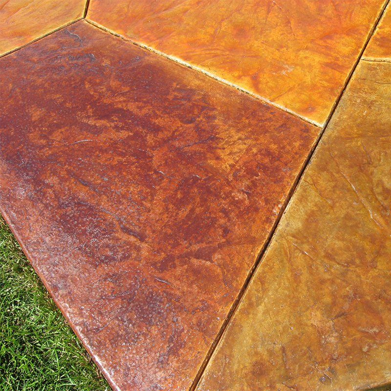 A close up of a concrete floor with different colors