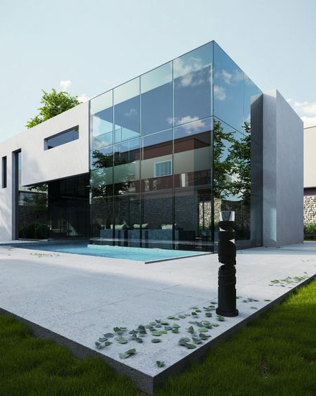 A modern house with a swimming pool in front of it