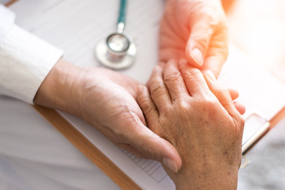 Elderly Patient With Physician Doctor