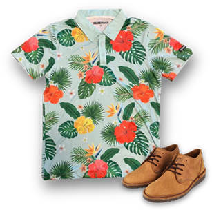 A polo shirt with tropical flowers and leaves next to a pair of brown shoes