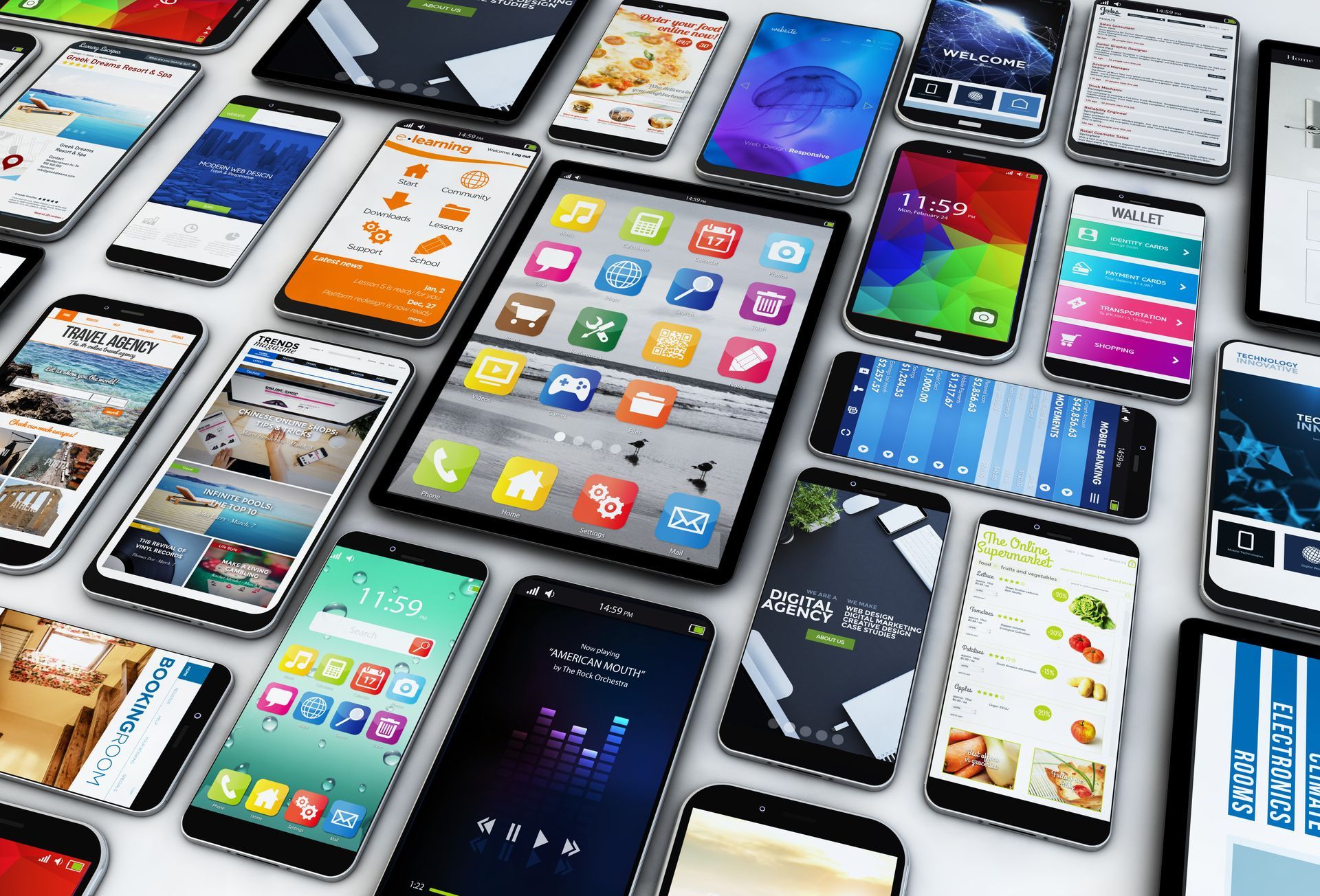 A white table with dozens of mobile devices on it