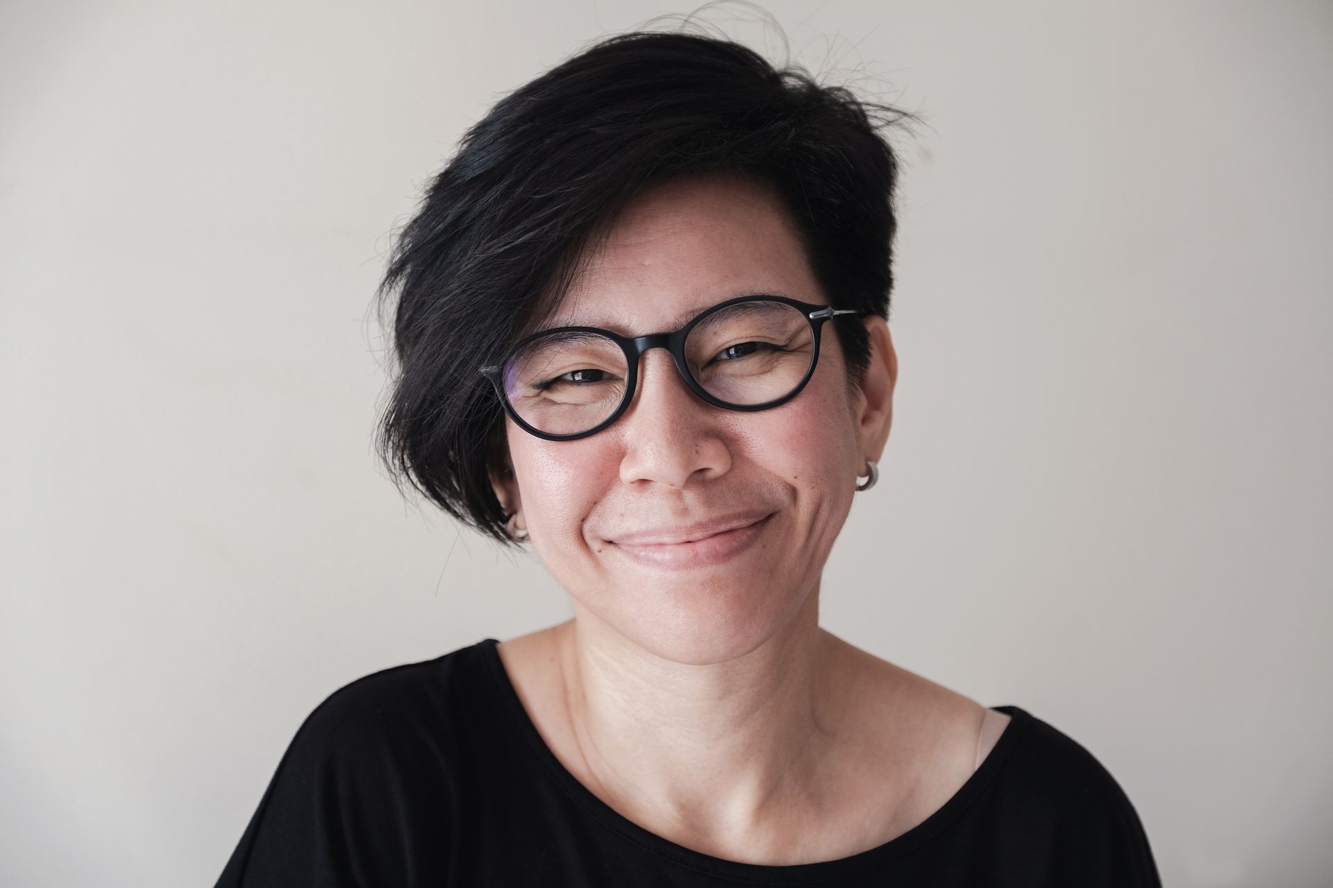 middle aged asian woman with glasses