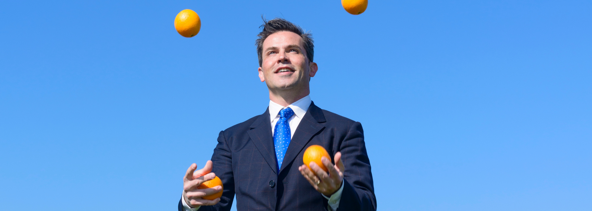 Picture of a businessperson juggling
