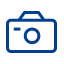 A blue icon of a camera with a handle on a white background.