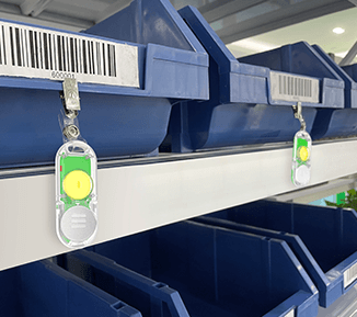 A bunch of blue bins are lined up on a shelf with (L102 Chargeable Wireless Light Tag)