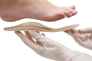 Doctor adapts insole to foot shape - foot care in Muscatine, IA