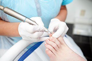 Cutting toe nails by pedicure - diabetic foot care in Muscatine, IA