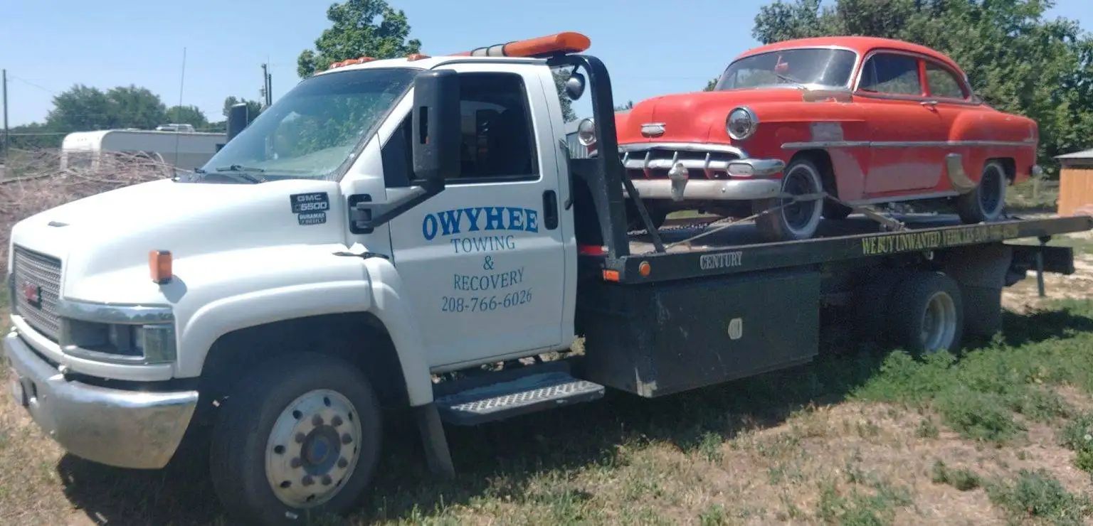 A white tow truck with 