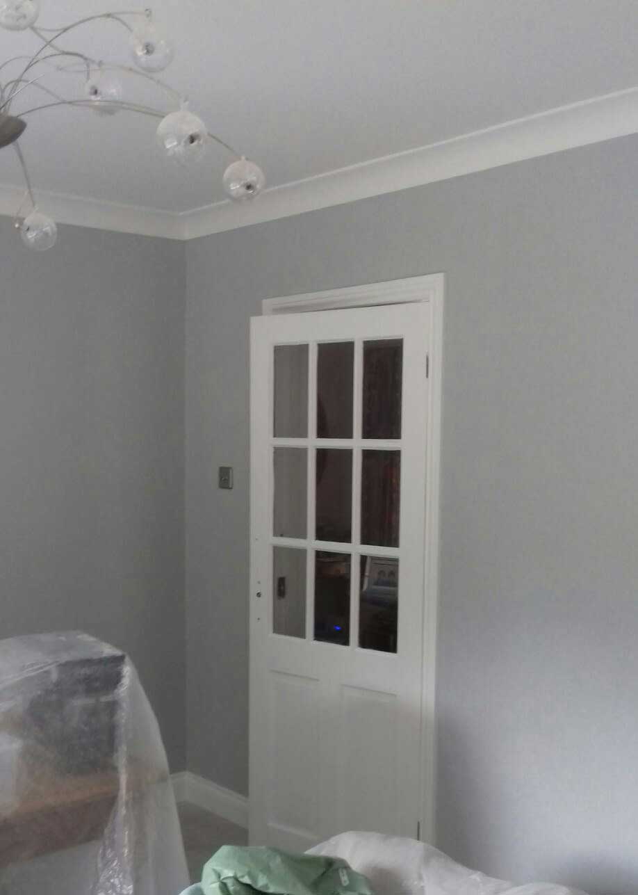 white door grey walls