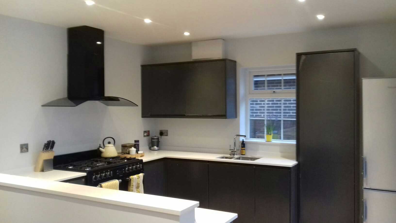 kitchen with black cupboards