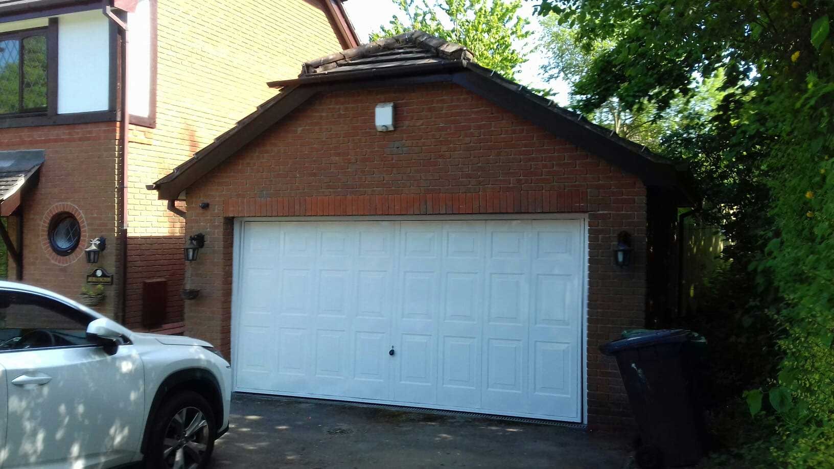 garage with white door