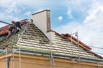 Two Men Are Working on The Roof of A House | Shelbyville, IN | SL Construction