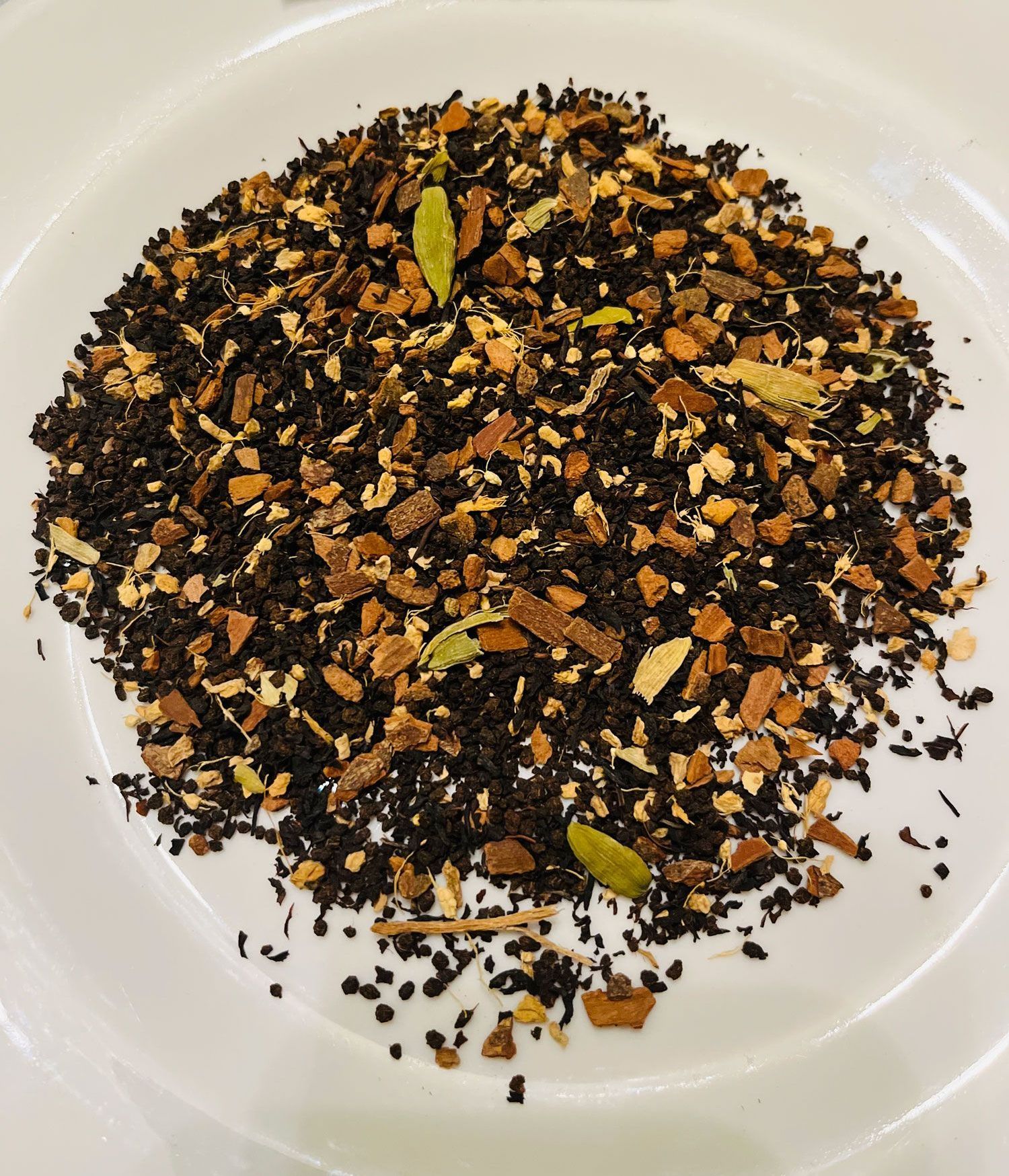 Masala Chai is an Indian tea blend famous for its spice and robust flavor. This tea is blended with black tea a range of spices and herbs, including cardamom, whole cloves, star anise, and peppercorns. This delectable spiced tea can be served either hot or iced.