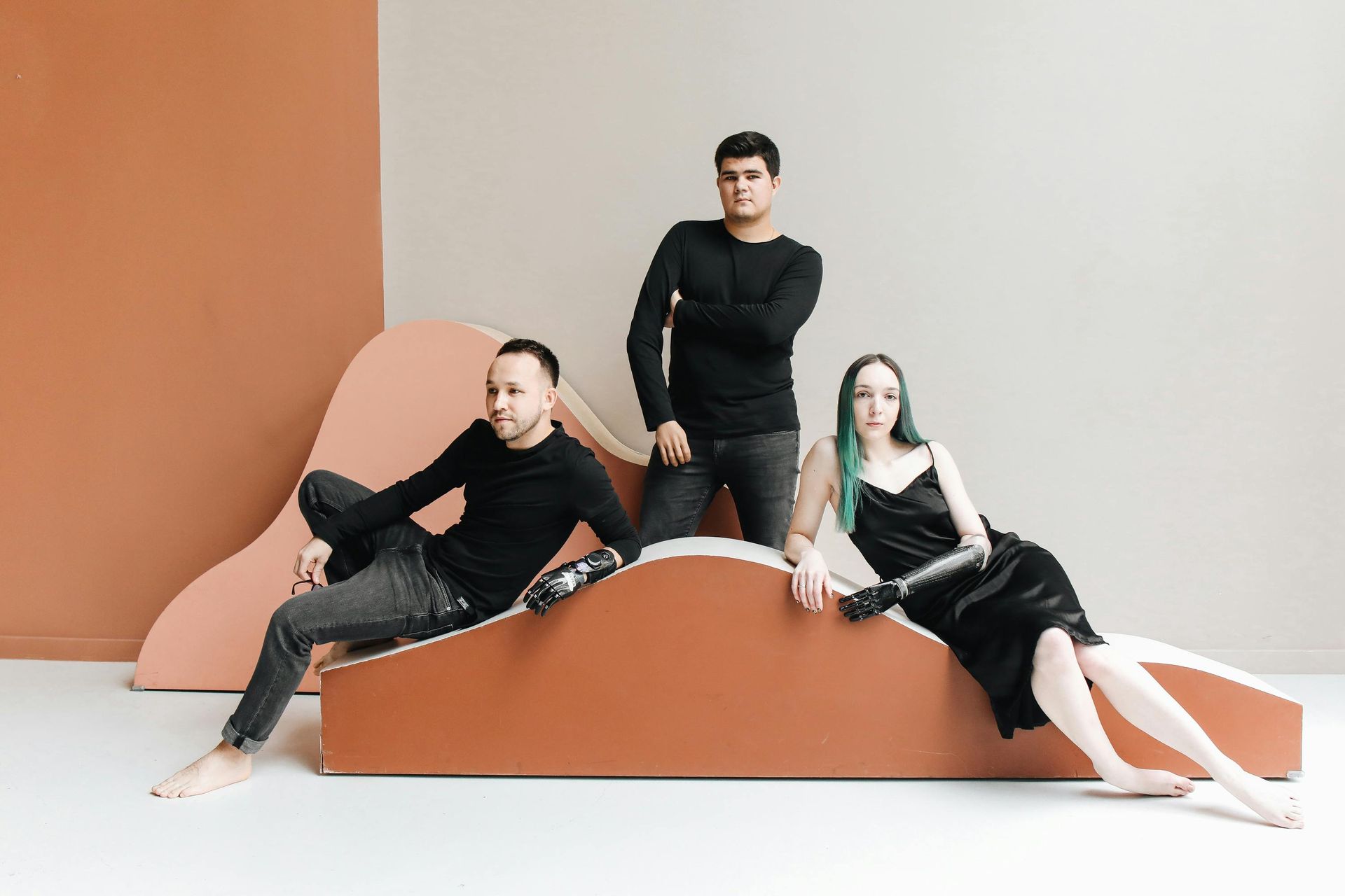 Mid-century modern cabinet with lamp, globe light, and rug in a sunny room.