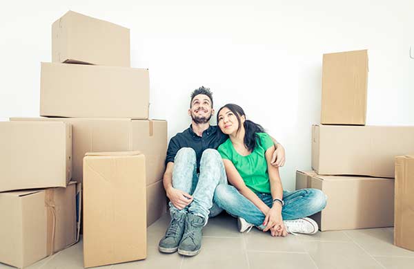 Couple with Moving Boxes