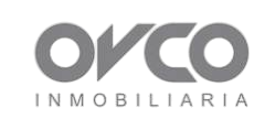 Logotipo de OVCO Inmobiliaria en color gris.