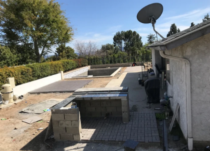 A house with a satellite dish on top of it