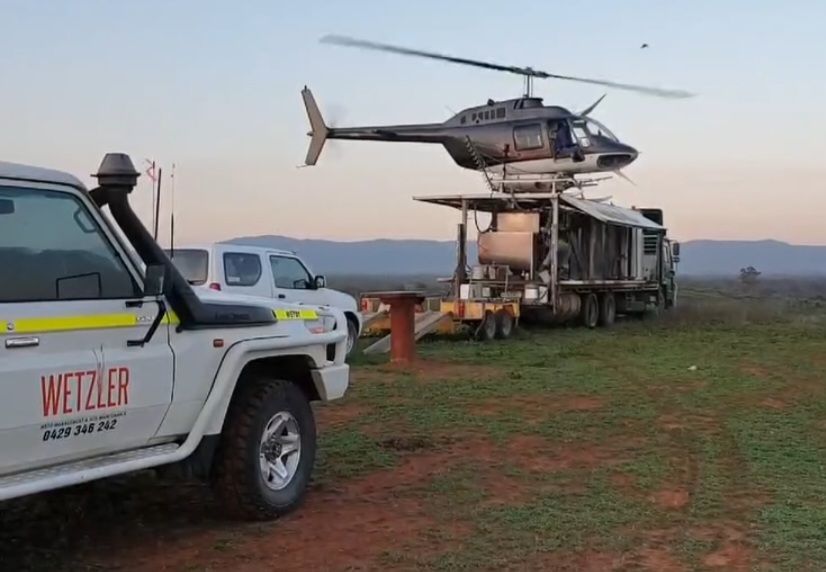 Wetzler Truck Is Parked Next To A Helicopter — Wetzler Pty Ltd In Marmor QLD
