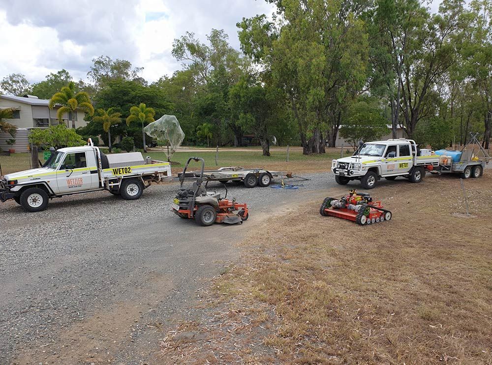Two Pickup Truck and two Lawn Mower Equipment — Wetzler Pty Ltd In Marmor QLD