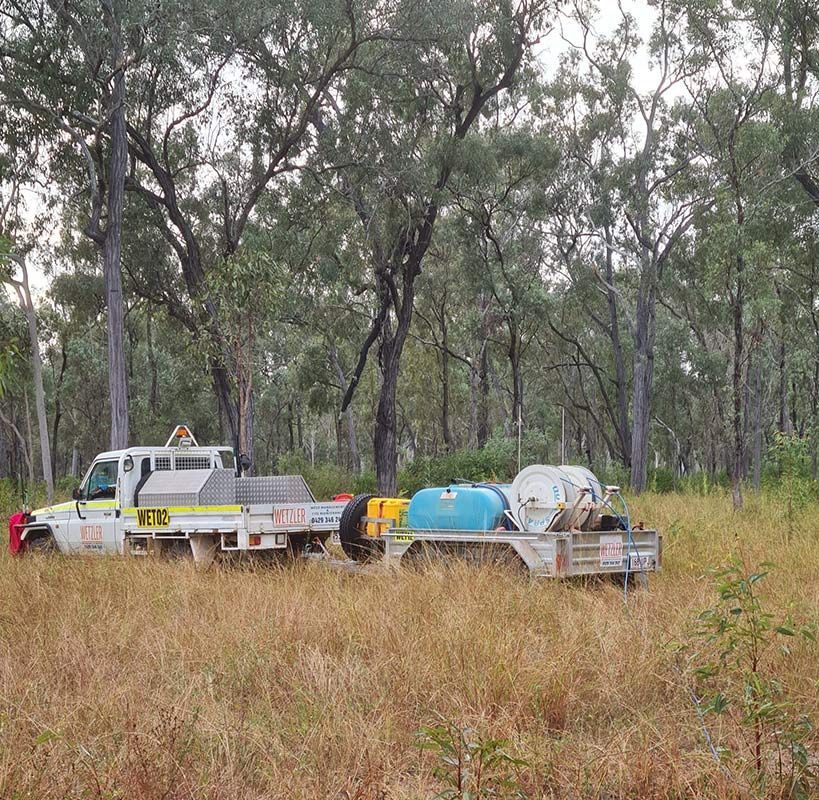 Wetzler wet 02 Pickup Vehicle with Trailer in the Middle of the big grass— Wetzler Pty Ltd In Marmor QLD