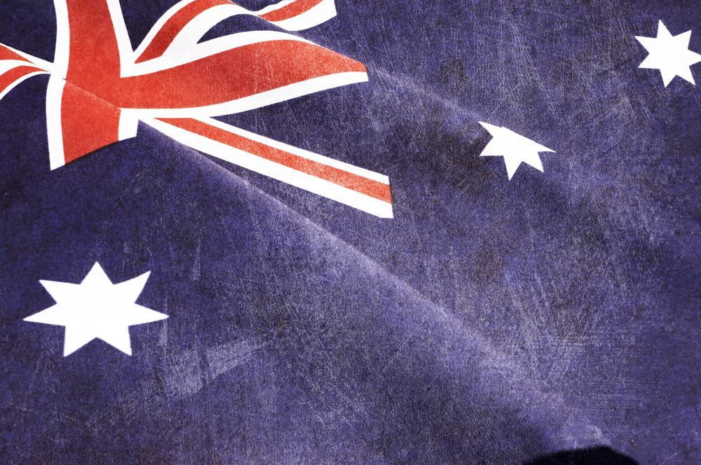A purple flag with red white and blue stripes and stars — The Denture Kitchen in Maroochydore, QLD