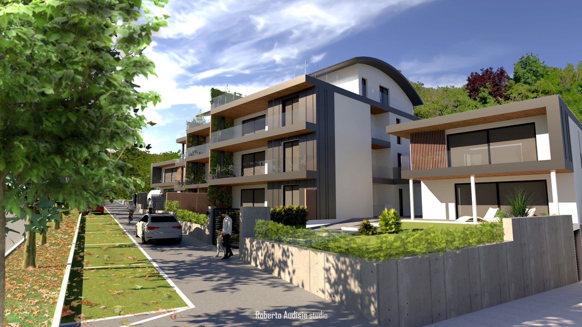 Moderno condominio con balconi, prato e un'auto in strada.