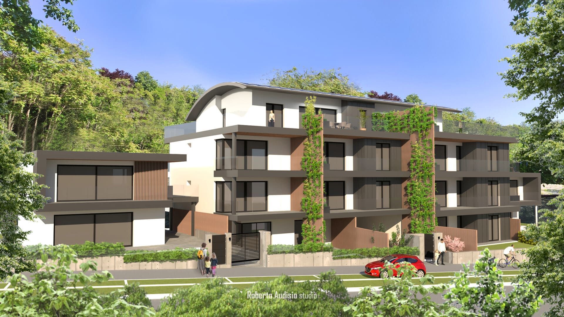 Moderno condominio a più piani con dettagli verdi; posizione soleggiata all'aperto.