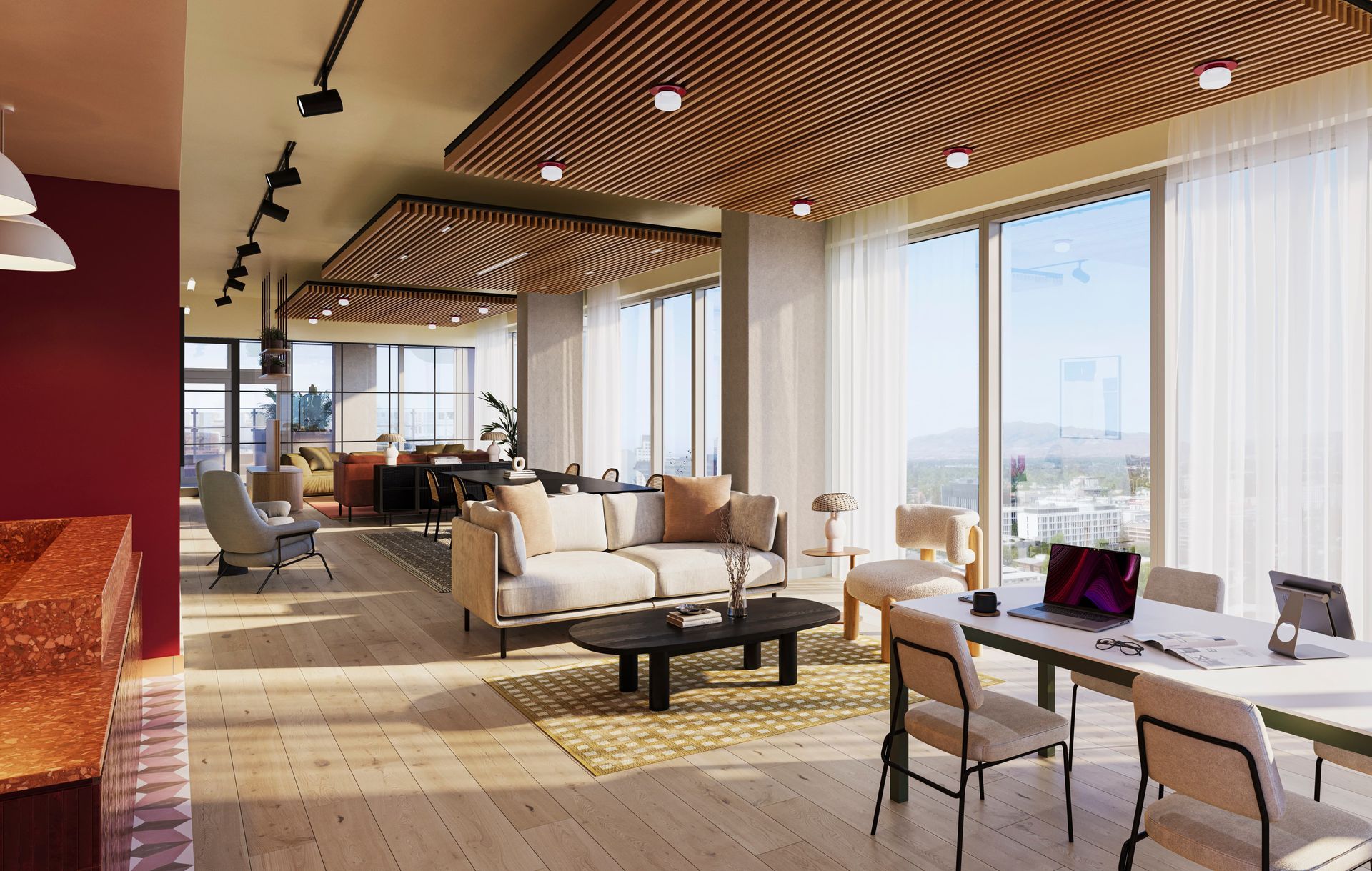 Modern lounge with wood ceiling, large windows, couches, and tables. Bright, open space.