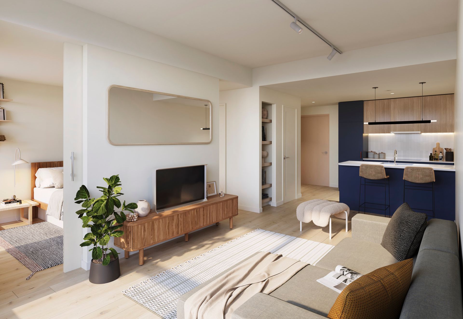 Modern apartment interior with living room, kitchen, and bedroom visible.  Wooden furniture, blue cabinets, and neutral color scheme.