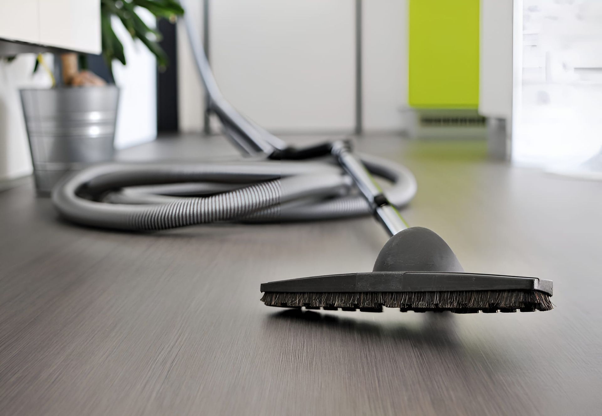 A Vacuum Cleaner is Sitting on a Floor — CTE Systems In Hallidays Point, NSW