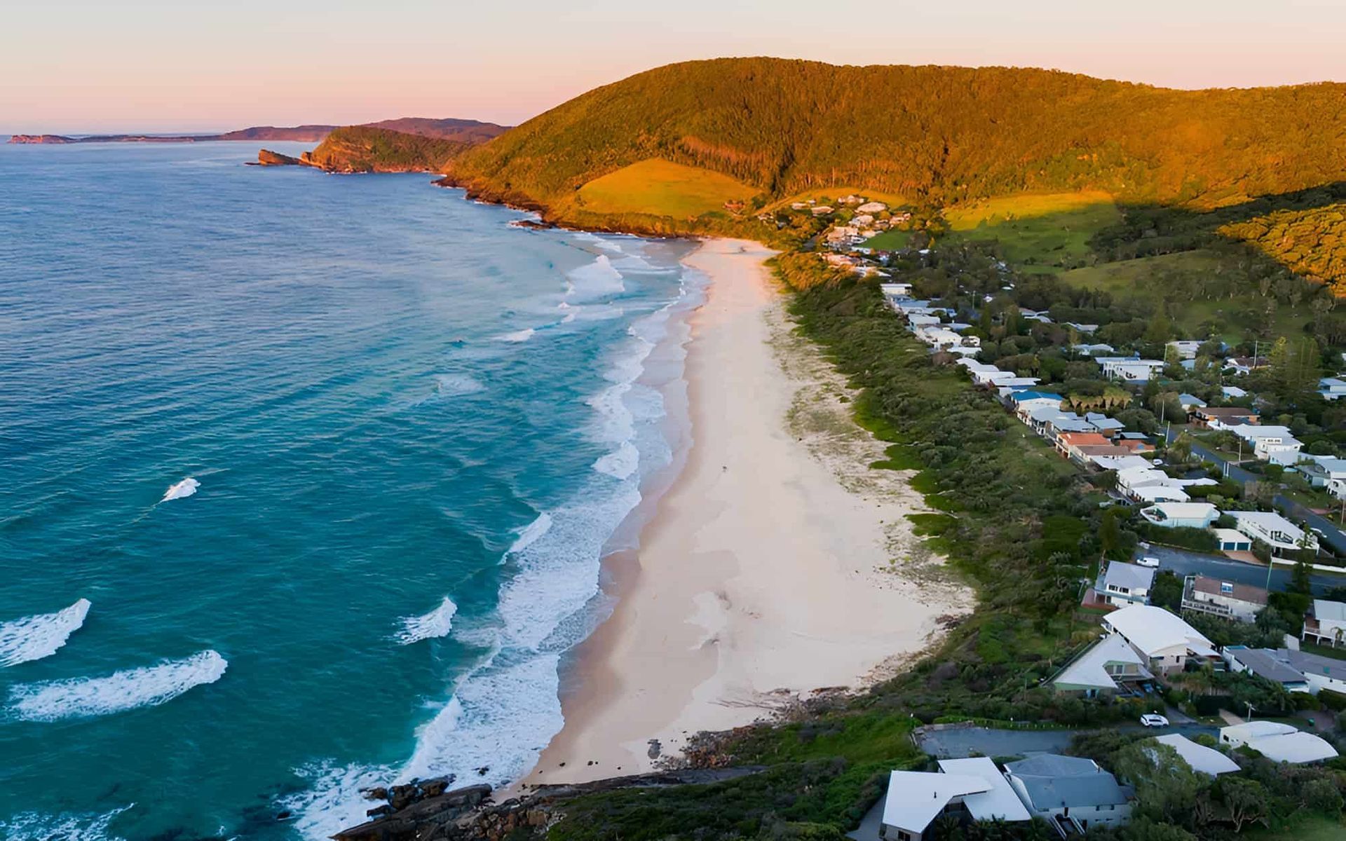 Aerial View of a Beach With Houses — CTE Systems In Forster, NSW