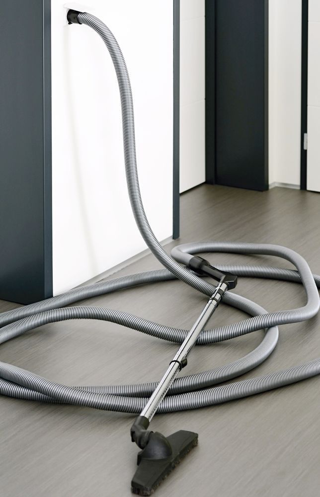 A Central Vacuum Cleaner Placed on the Floor — CTE Systems In Tuncurry, NSW