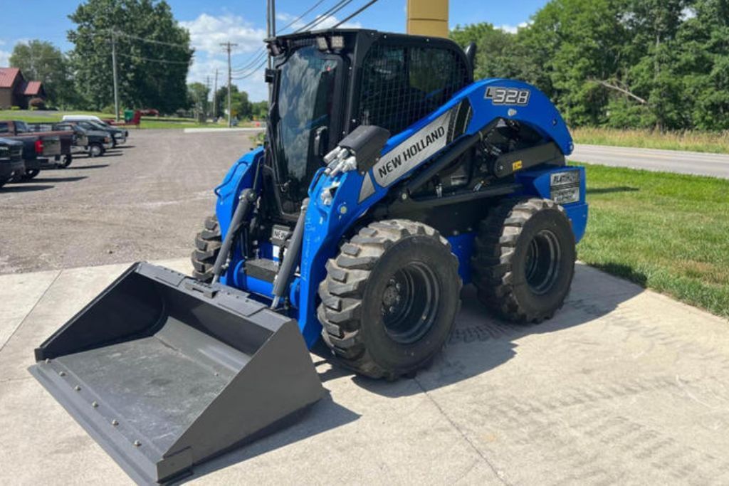 Skid steer parked on concrete, used by Samuel Site Service for land clearing in DeBary, FL and nearby areas.