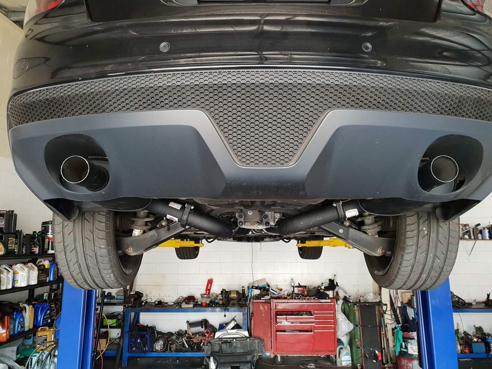 Lifting The Car For Under Chasis And Exhaust Repair — Airlie Beach Exhaust and Mechanical In Cannonvale, QLD