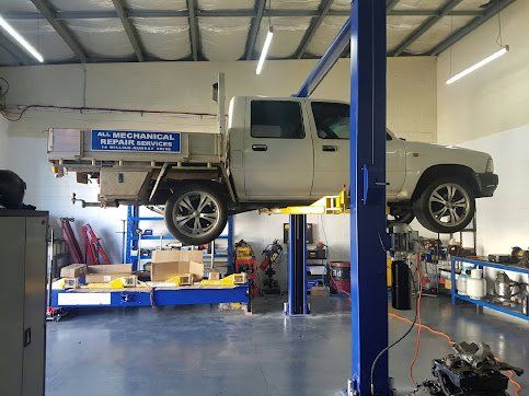 Pick Up Vehicle Lifting For Maintenance — Airlie Beach Exhaust and Mechanical In Cannonvale, QLD