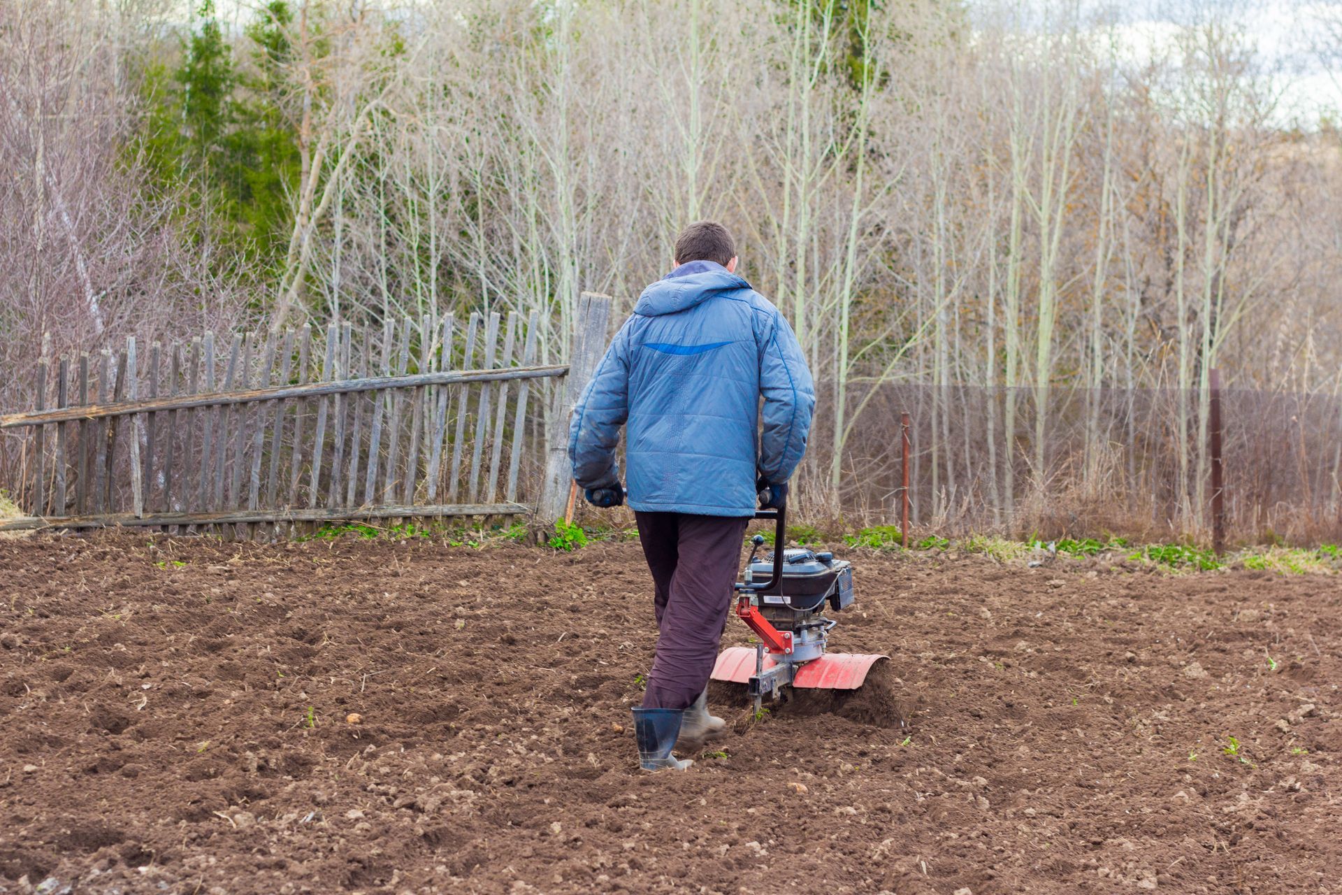Visionary Fertilization expert aerating and seeding in Auburn Hills, MI
