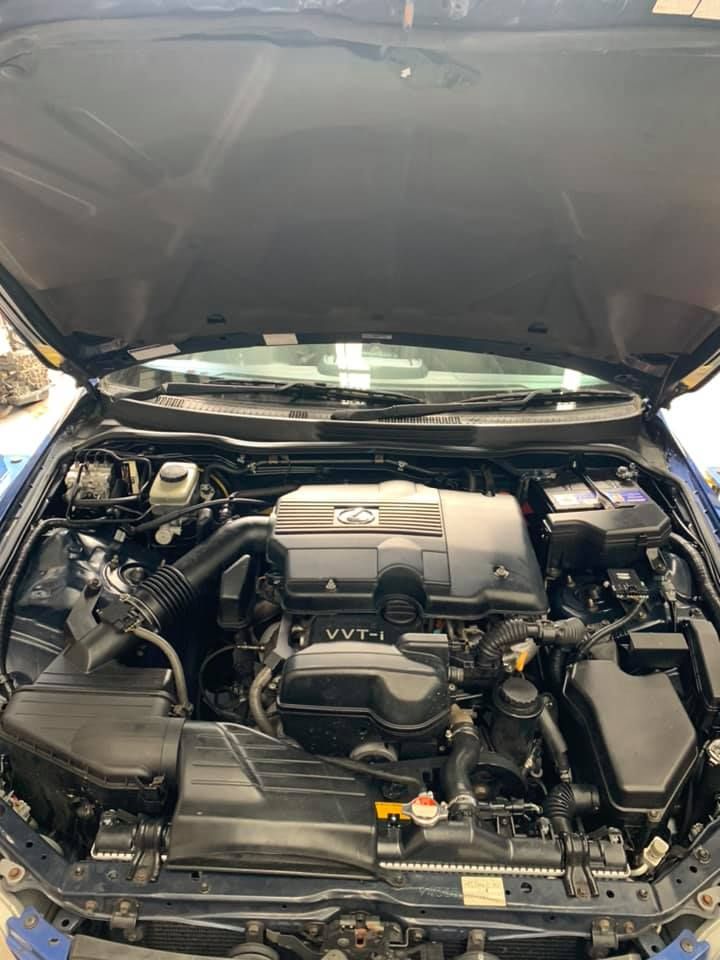 Open Car Hood Reveals a Dark Engine Bay — D.A.G Automotive in Unanderra, NSW