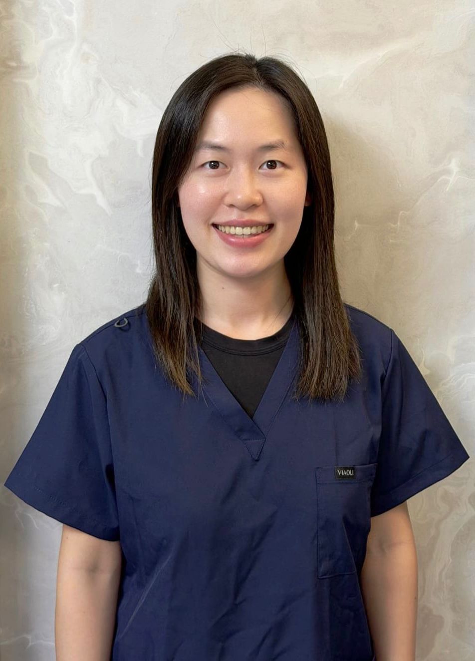 Dr. Lorraine Tang - Dentist
