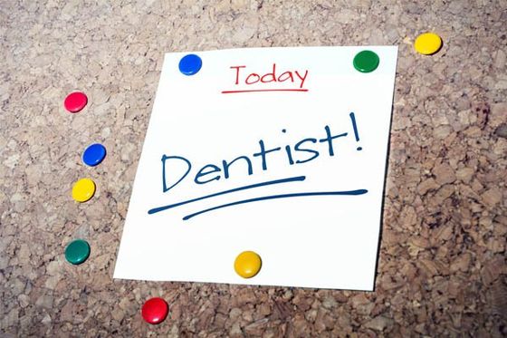 dentist appointment reminder for today on pin board
