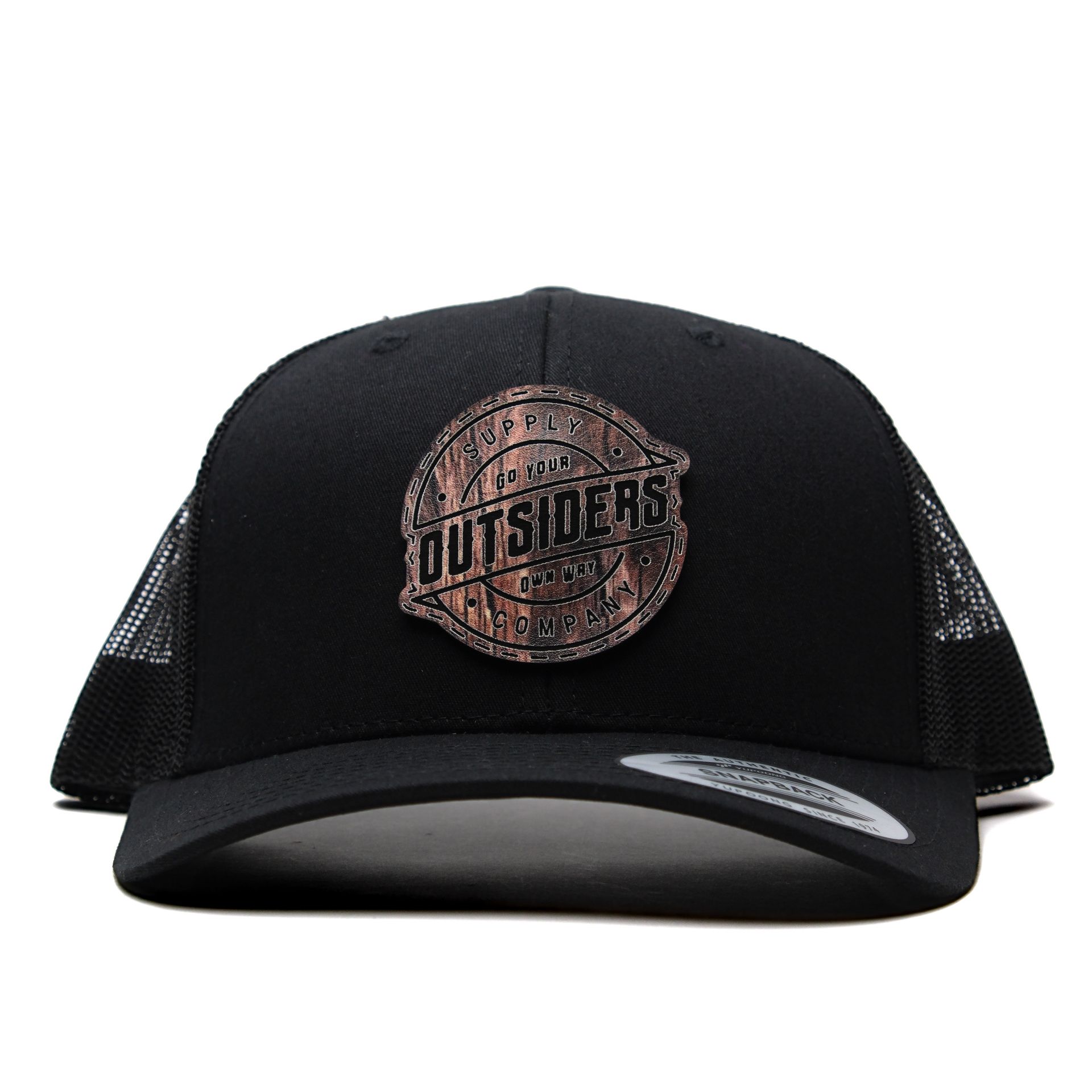 A black hat with a patch that says outsiders