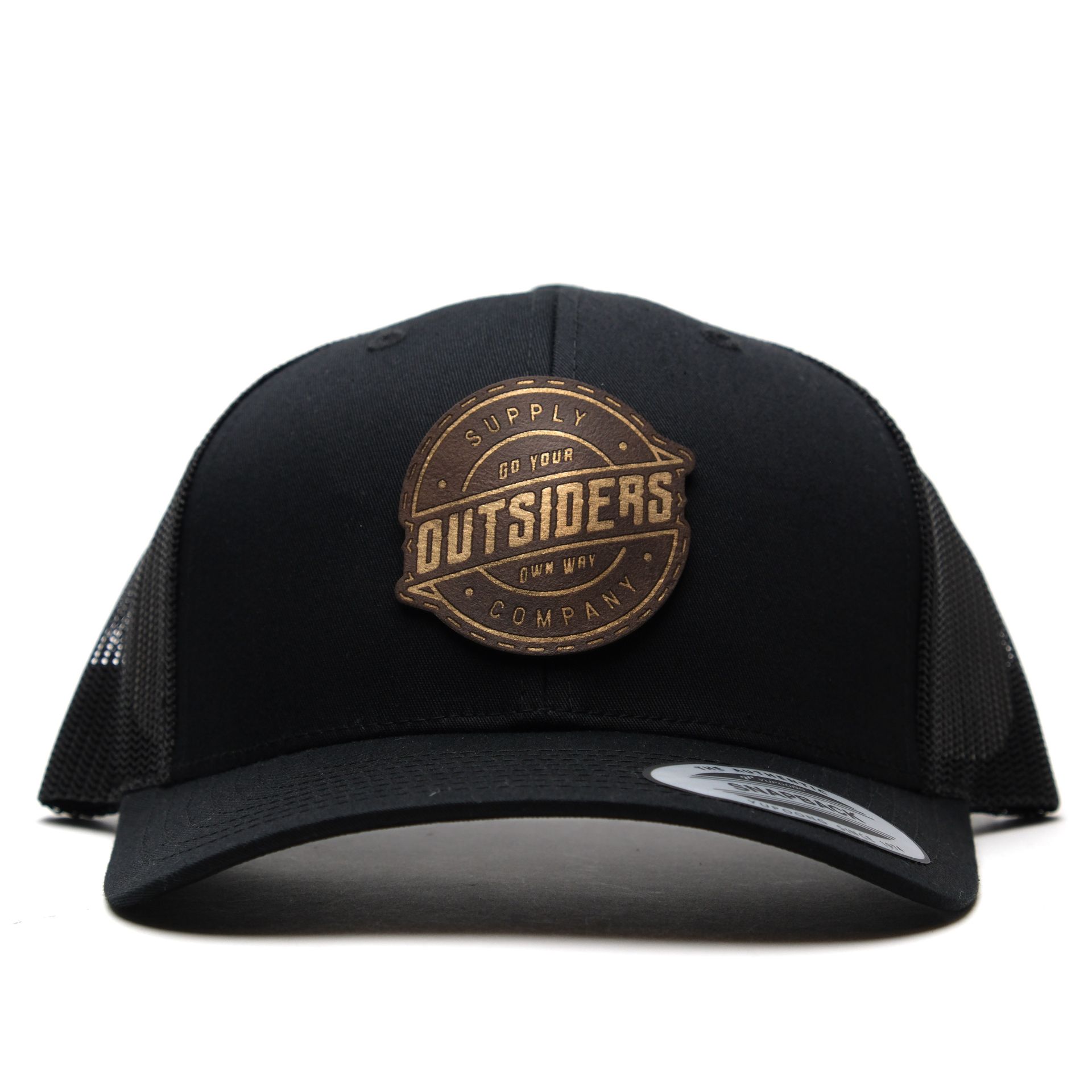 A black hat with the word outsiders on it