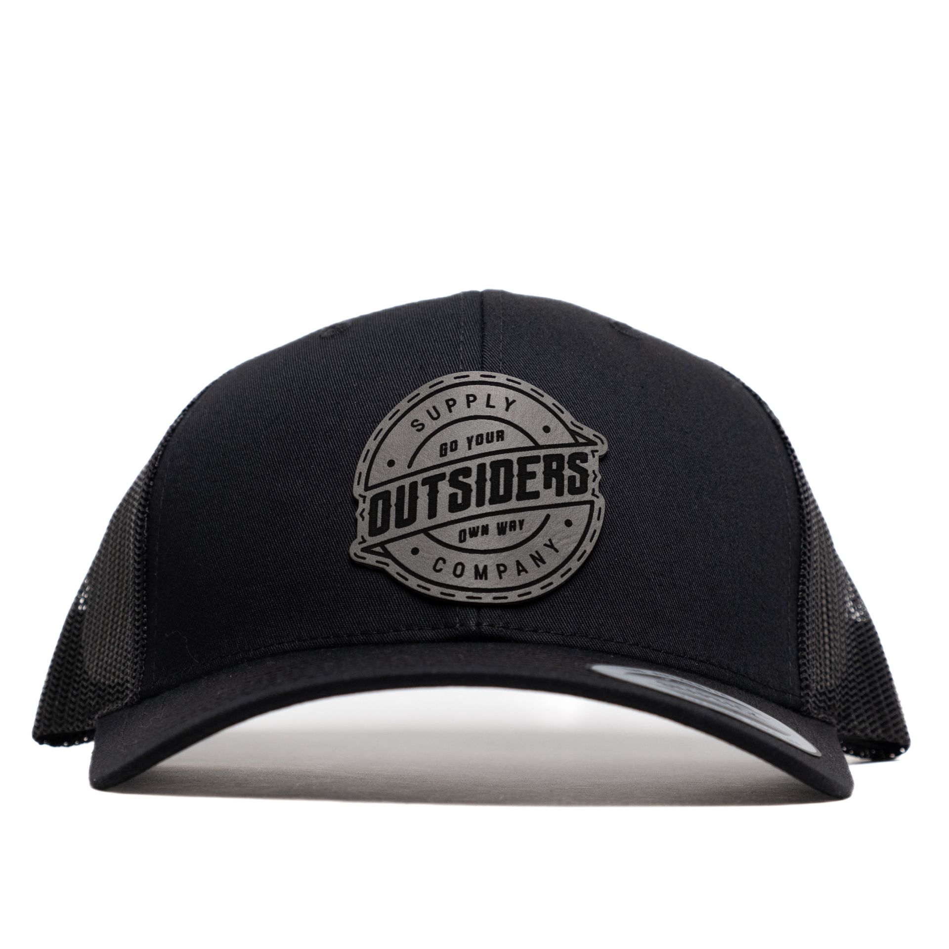 A black hat with a patch that says outsiders on it