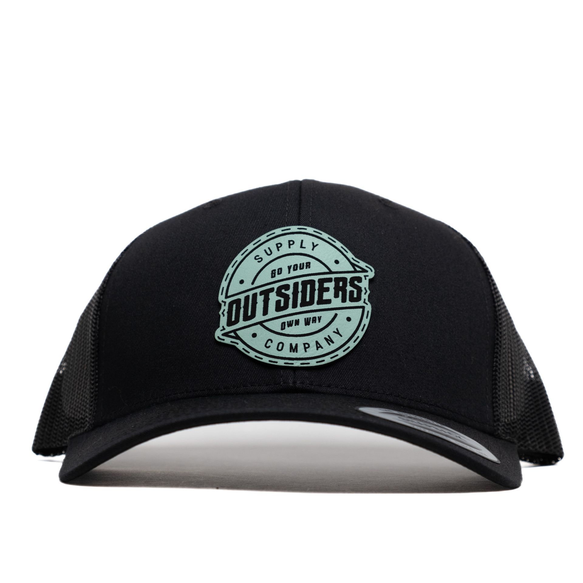 A black hat that says outsiders on it