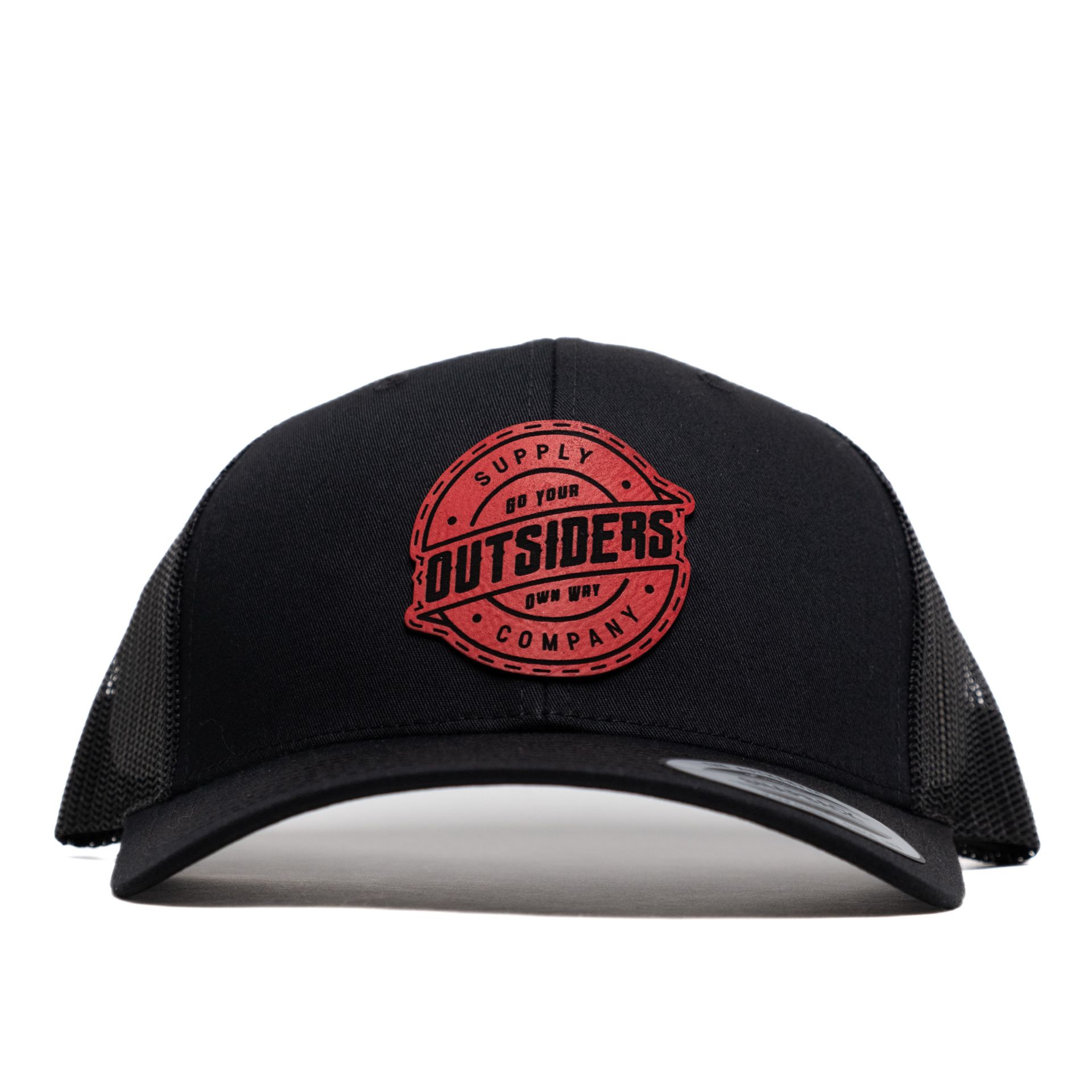 A black hat with a red outsiders logo on it