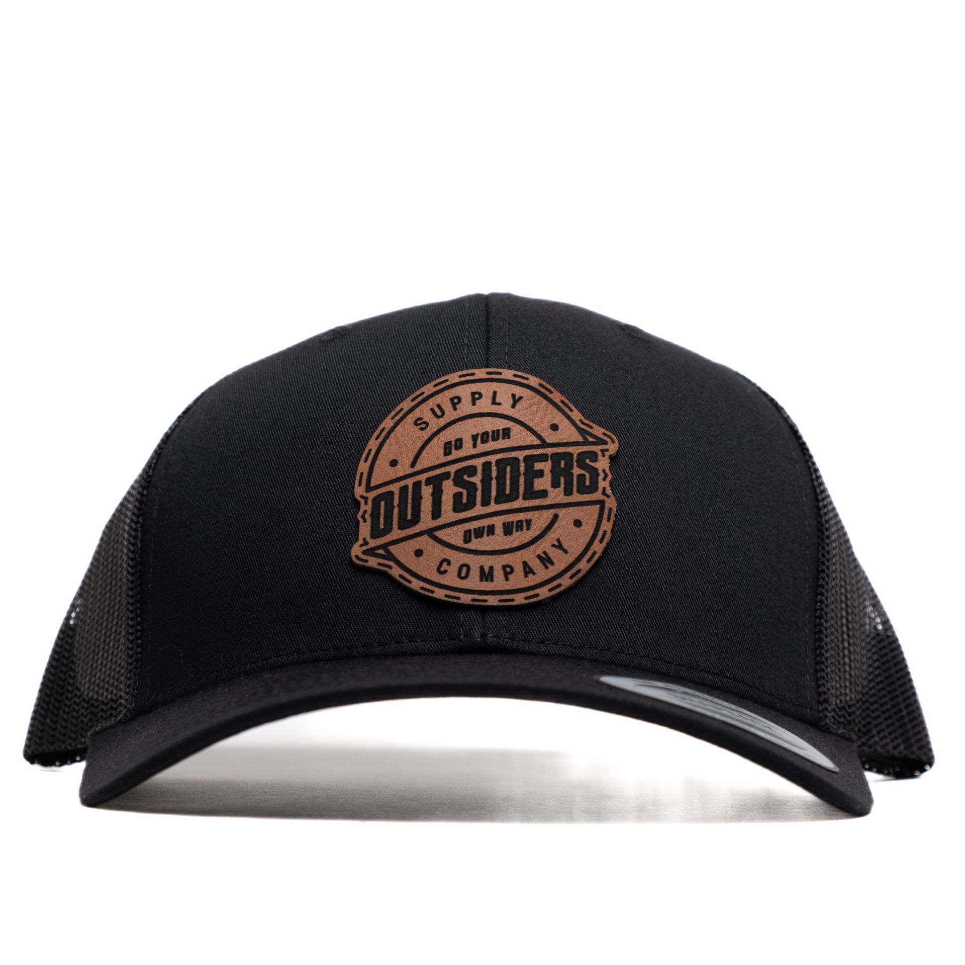 A black hat with a brown outsiders logo on it