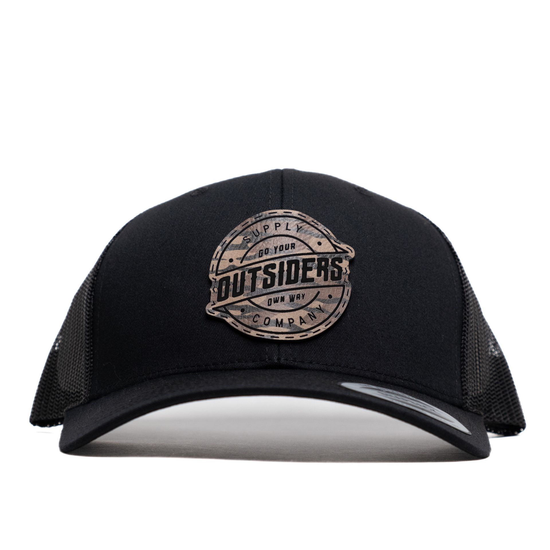 A black hat with a patch that says outsiders on it