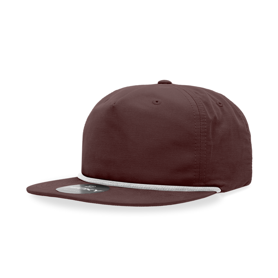 A maroon baseball cap with a white rope around the brim on a white background.